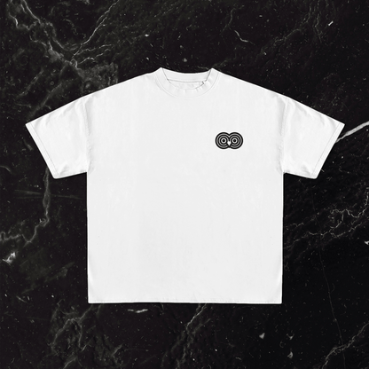 "Stylish white T-shirt with owl print, drop shoulder design for casual active looks"  "Casual white T-shirt with owl print and drop shoulder fit, perfect for active wear"  "White drop shoulder T-shirt featuring an owl design for effortless active style" 