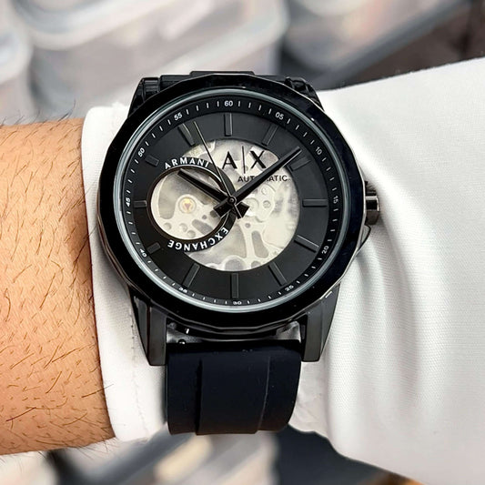 "Armani Exchange classic men's watch with stainless steel band and minimal design"  "Armani Exchange elegant silver watch with sleek dial and logo detail"  "Armani Exchange women's classic watch with rose gold-tone stainless steel strap"