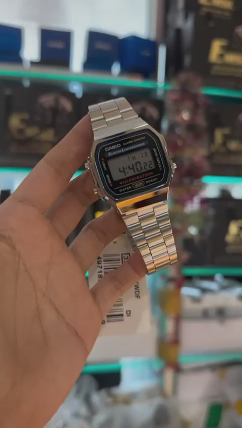 "Casio smartwatch with fitness tracking and touchscreen display"  "Casio gold-tone digital watch with backlight and adjustable band"